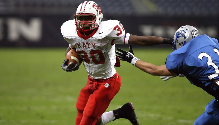 katy texas highschool football running back with dental fitted mouthguard