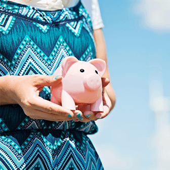 woman holding piggy bank